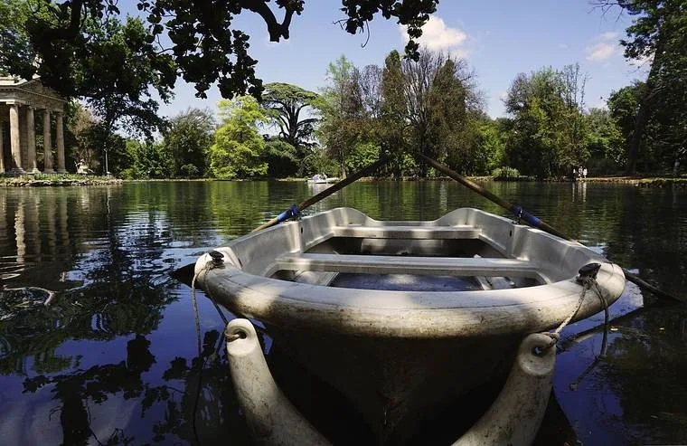 Lake and gardens of Villa Borghese in Rome